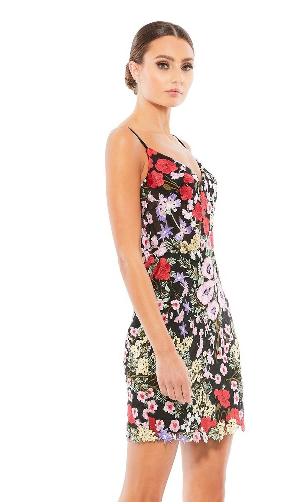 A woman wearing the Mac Duggal 67459 short floral-print party dress poses against a white background.